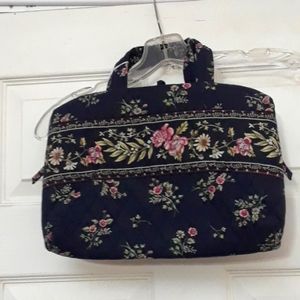Vera Bradley quilted toiletry bag.